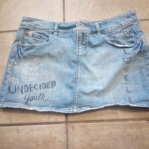 Stylish Blue Denim Mini Skirt with Graphic Accents